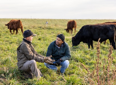 Serge Koenig and Roman MIller talking. Photo by Finn Ryan